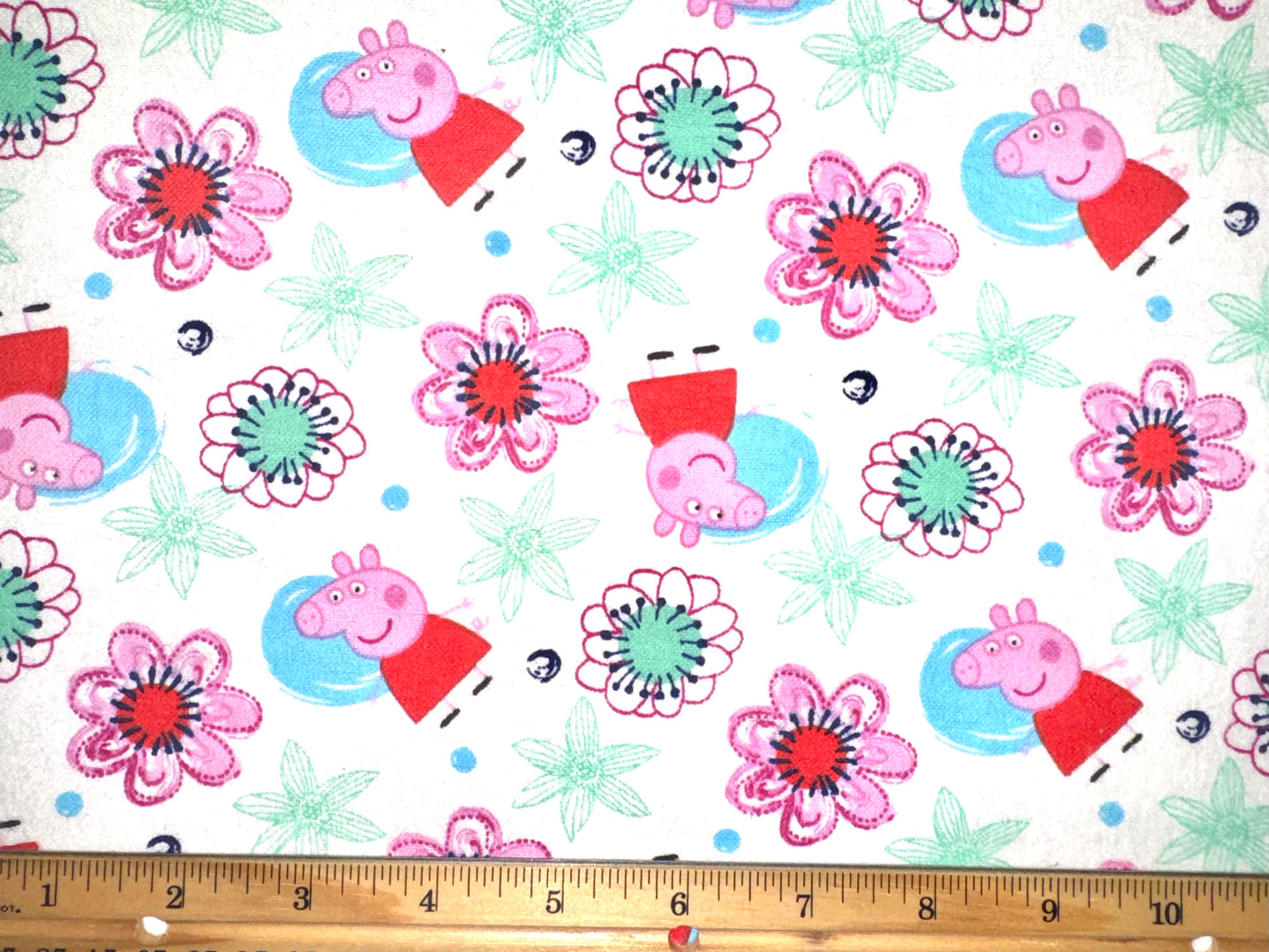 Peppa Pig White Toss Flannel Licensed Fabric by Springs Creative